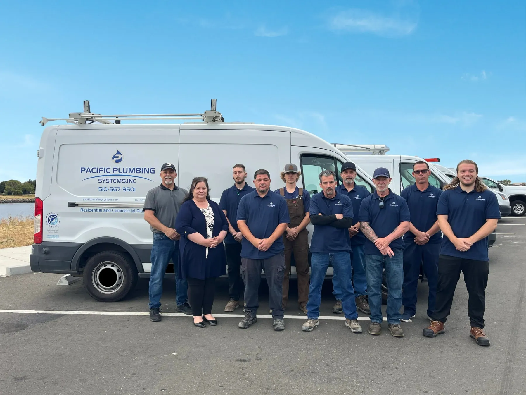The Pacific Plumbing Systems team in front of the vans